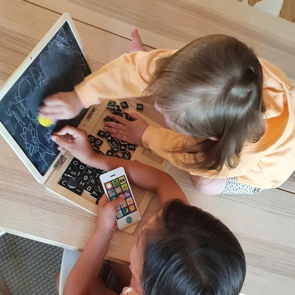 Wooden laptop with magnetic board